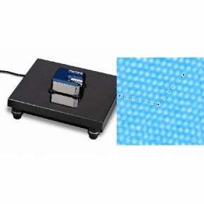 Atomic Resolution of the graphite surface by STM (Scanning Tunneling Microscope)