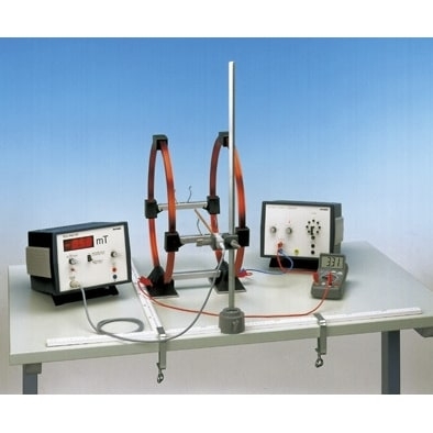 Magnetic field of paired coils in a Helmholtz arrangement with a teslameter