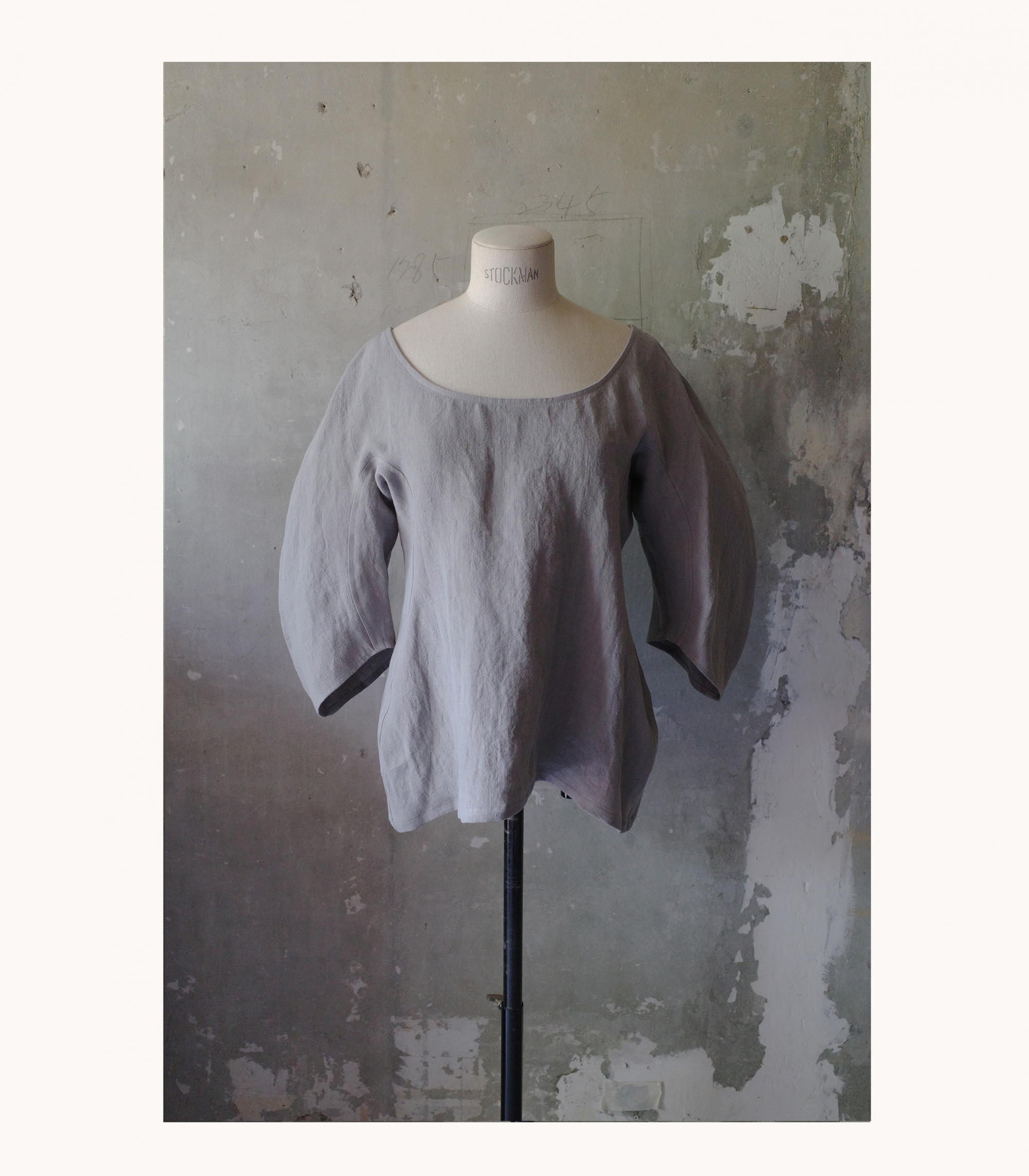 Signature curved linen blouse