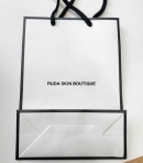 루다스킨-로고백