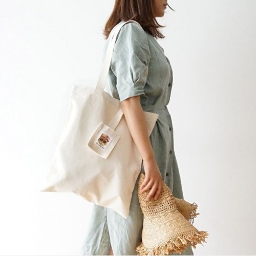 Strap pocket shoulder bag